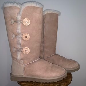 tan tall Ugg boots with buttons